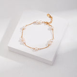 Gold and Pearl Strand Set