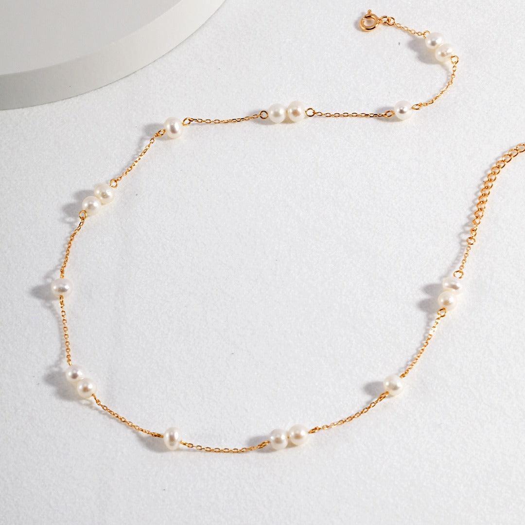 pearl and gold strand necklace apelila jewelry
