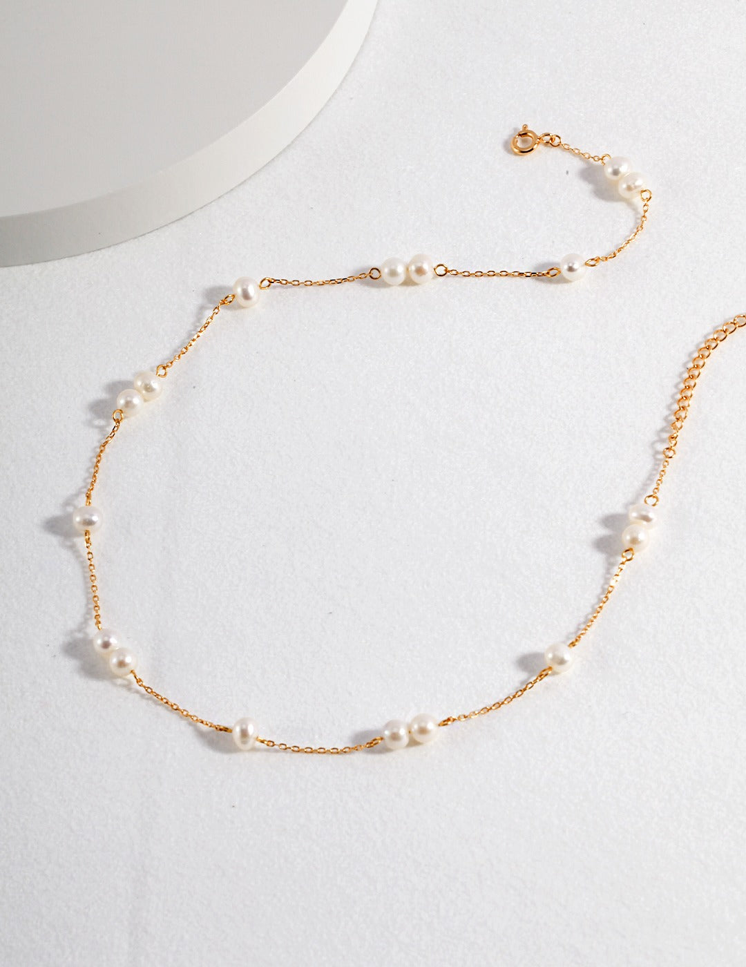pearl and gold strand necklace apelila jewelry