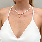18k gold and freshwater pearl necklace on model