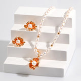 golden tide pearl jewelry earrings and necklace