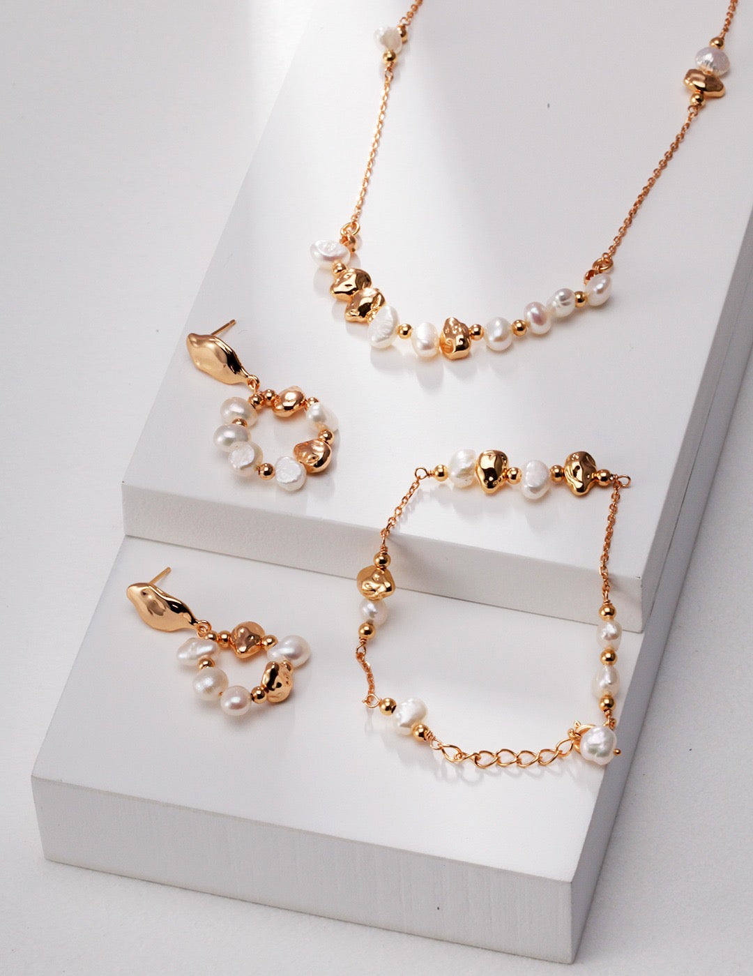 gold and pearl jewelry collection