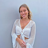 18k gold shell necklace stack on blonde model