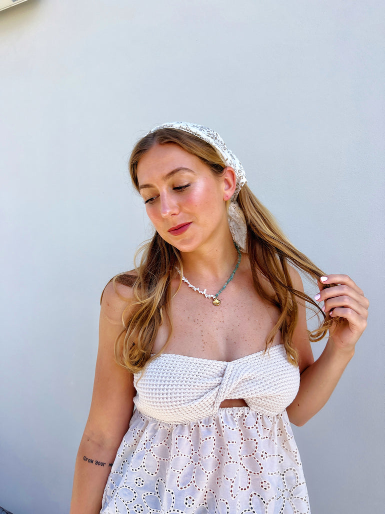 pearl necklace on blonde model