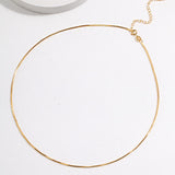 gold strand necklace apelila jewelry