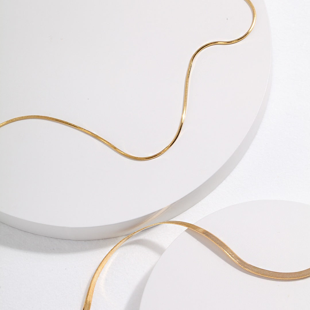 18k gold strand necklaces